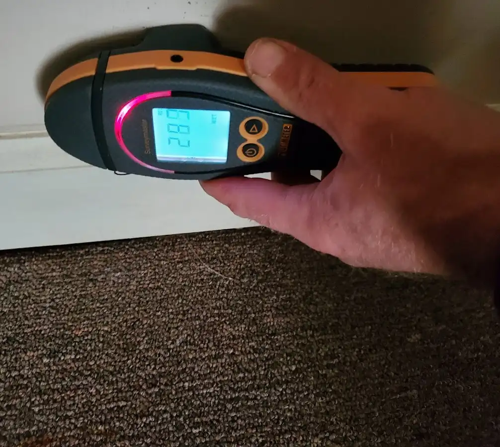 Moisture detection at baseboard during Sewage Cleanup & Sanitation in El Granada